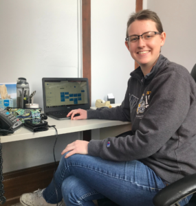 kate sitting on her desk