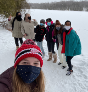 Elena with children in snow