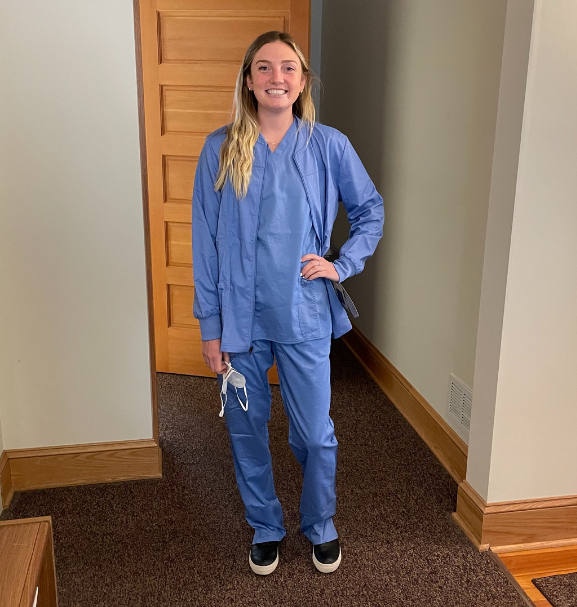 Kasia Kwitnieski Blog 1 wearing blue scrubs at Francis House