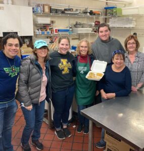 RaeAnn with volunteers at Assumption Food Pantry